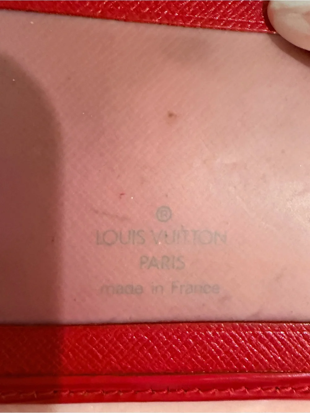 Signature Louis Vuitton textured Epi leather slim wallet